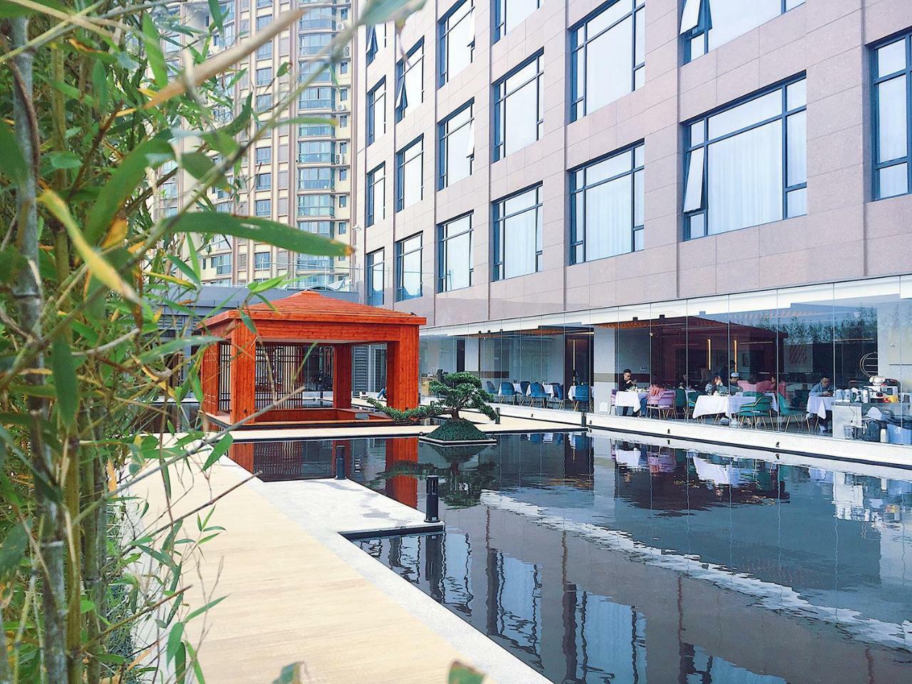 פושאן Virtuous World Hotel מראה חיצוני תמונה