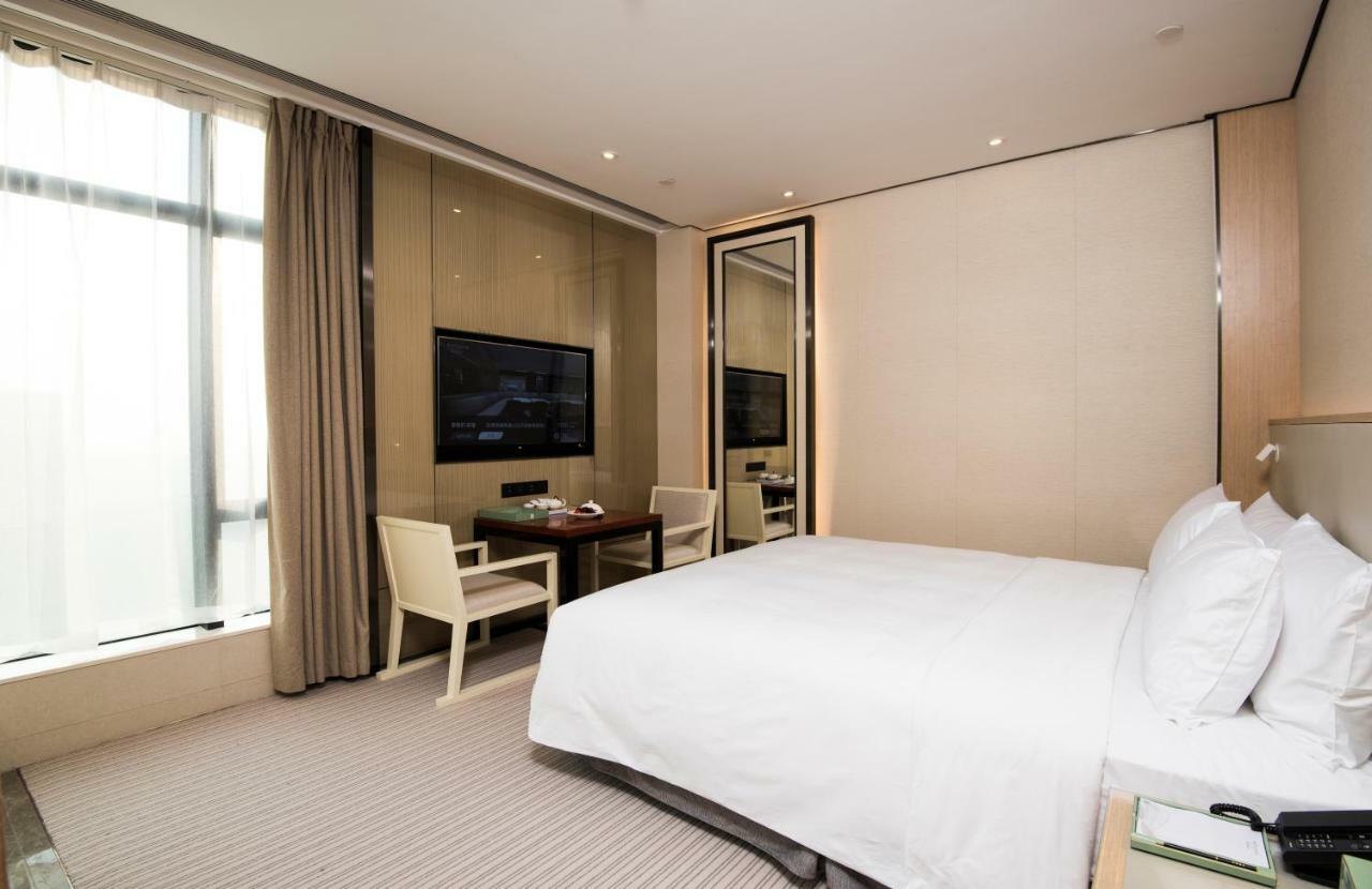פושאן Virtuous World Hotel מראה חיצוני תמונה