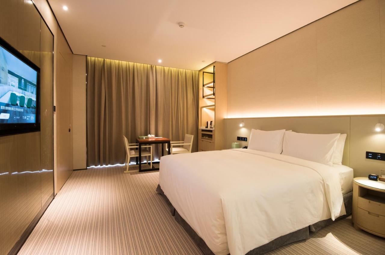 פושאן Virtuous World Hotel מראה חיצוני תמונה