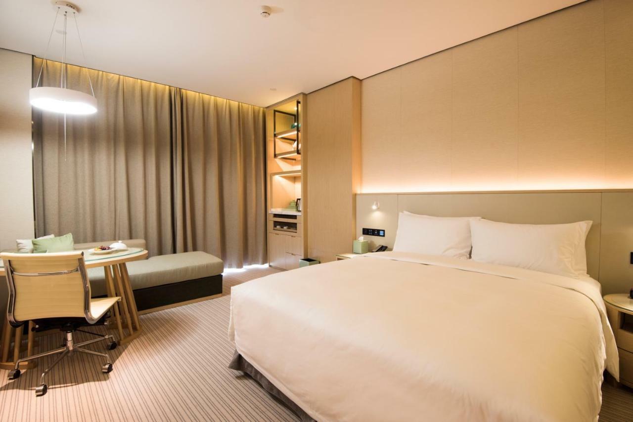 פושאן Virtuous World Hotel מראה חיצוני תמונה