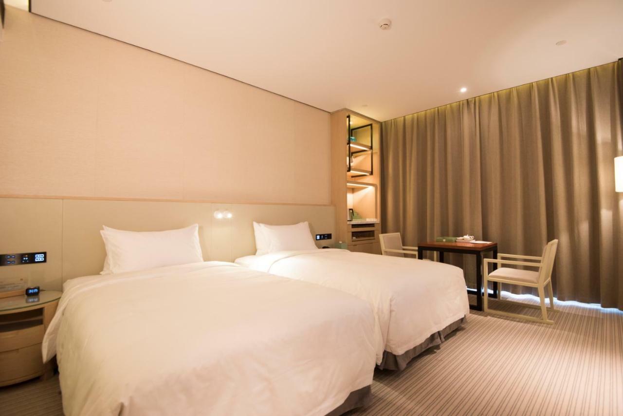 פושאן Virtuous World Hotel מראה חיצוני תמונה