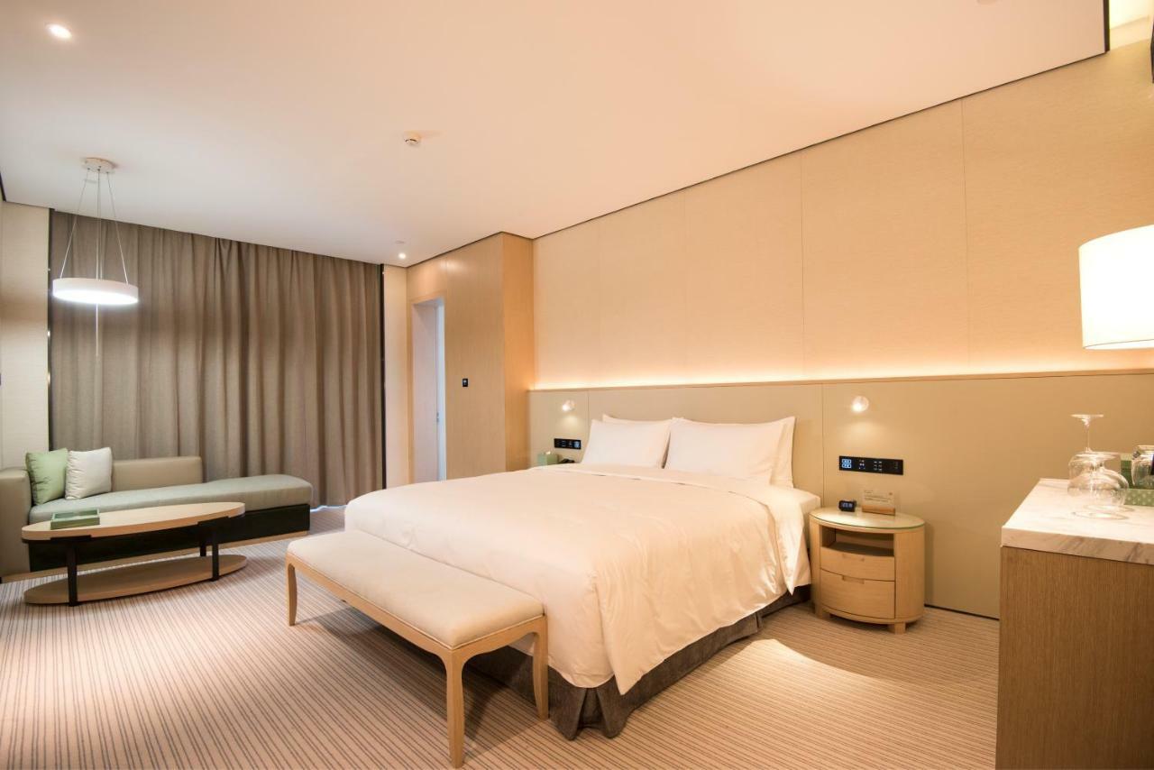 פושאן Virtuous World Hotel מראה חיצוני תמונה